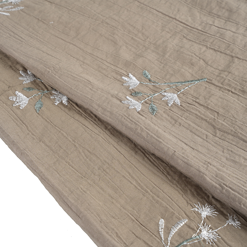 Persikka-orkideakirjonta kukka-ryppykangas