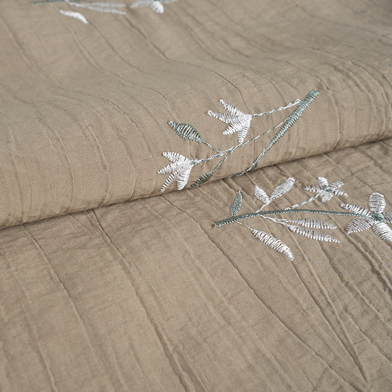 Persikka-orkideakirjonta kukka-ryppykangas