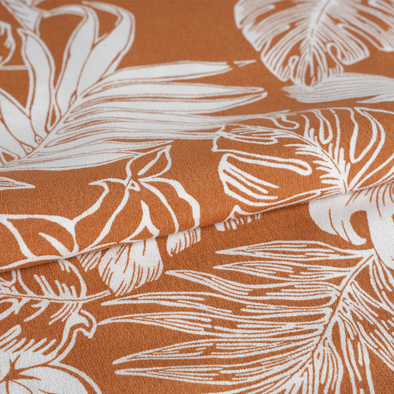 Runsas kudottu painettu kreppikangas