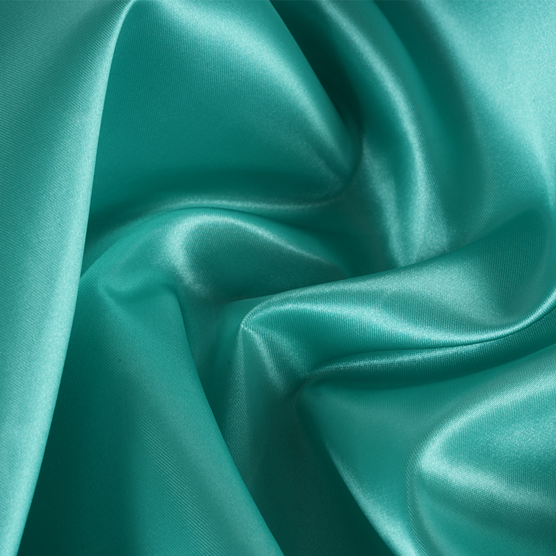 50/75 kiiltävä kiertymätön satiini + ohut mela päällä kangas