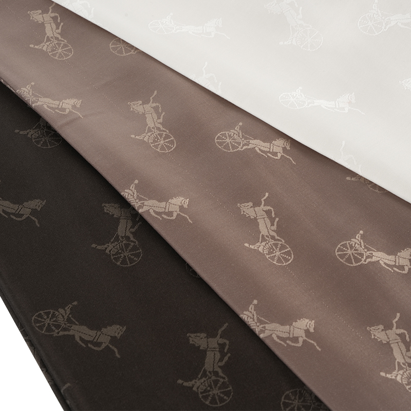 Polyesteri/puuvilla-jacquard-kangas